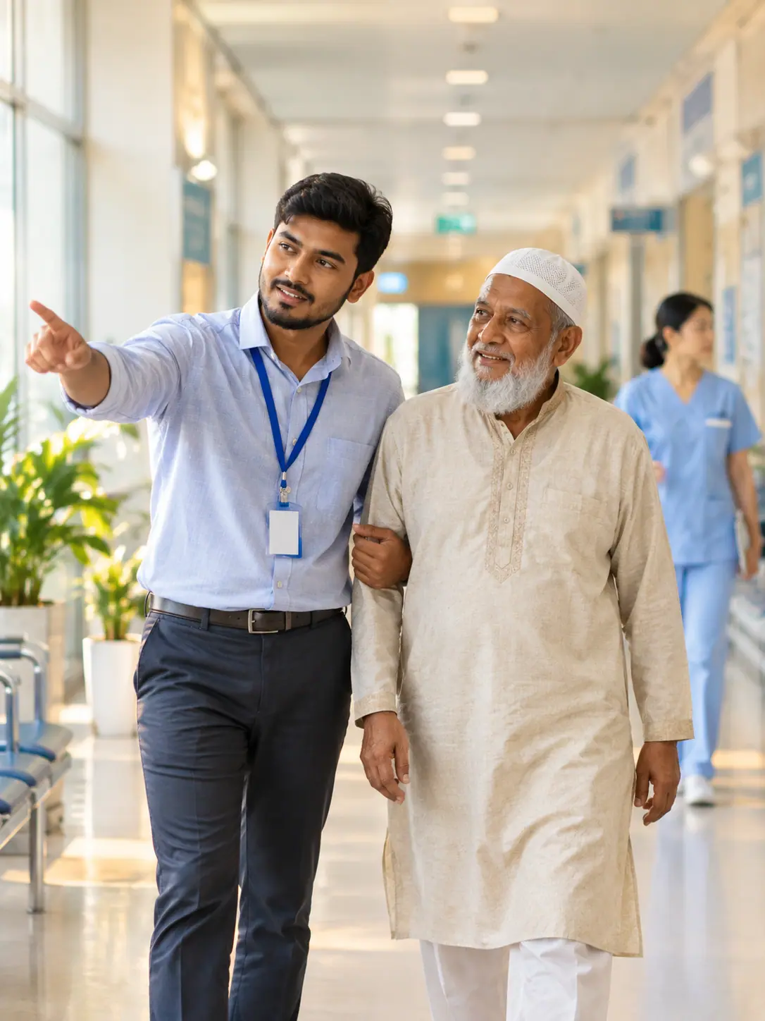 A Bangladeshi guide walking an elderly father through a hospital corridor in China
